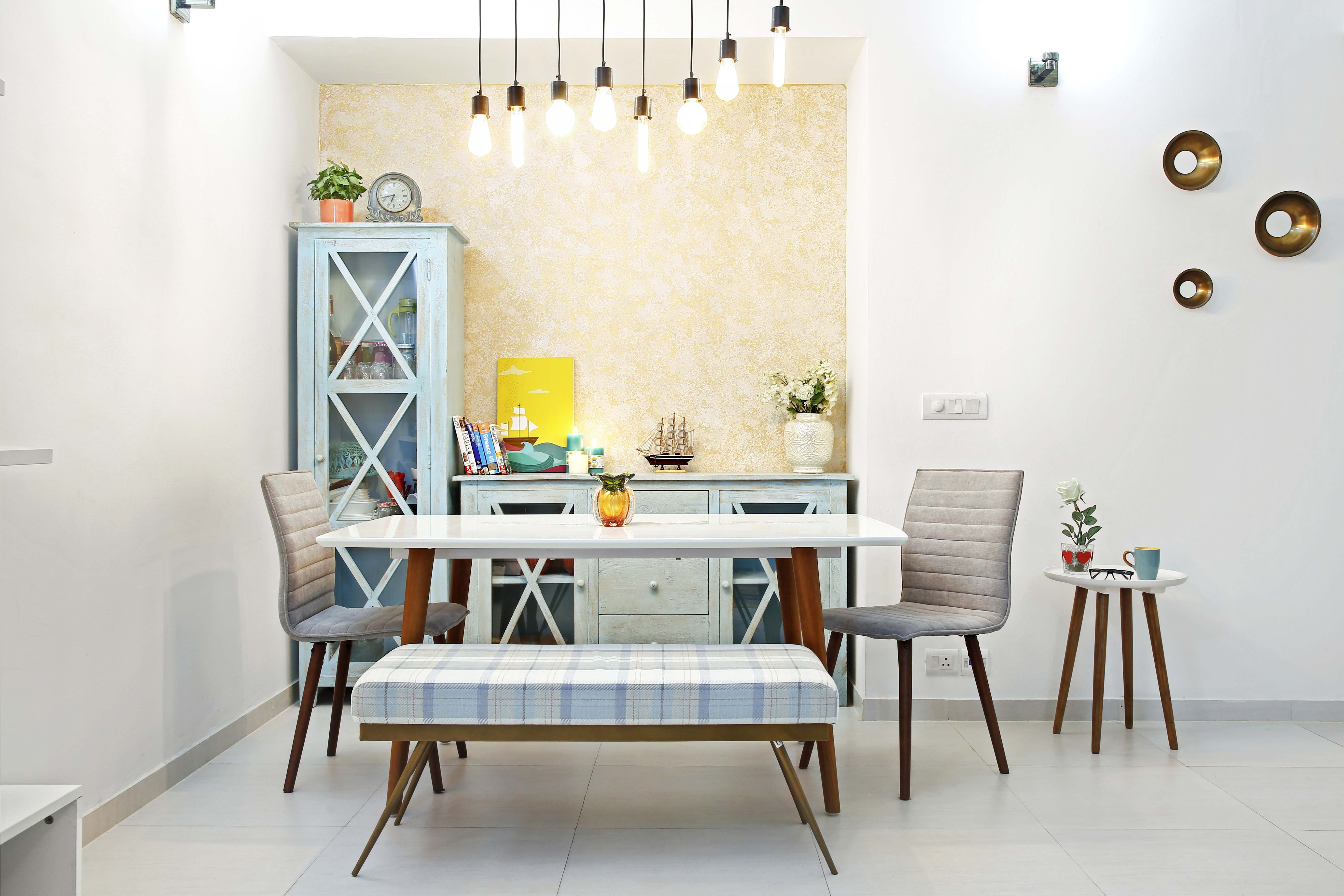 Modern 4-Seater Dining Room Design With A Crockery Unit